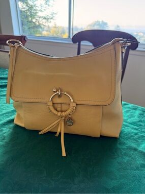 See By Chloe Pale Yellow Leather Crossbody with Ring Tassel